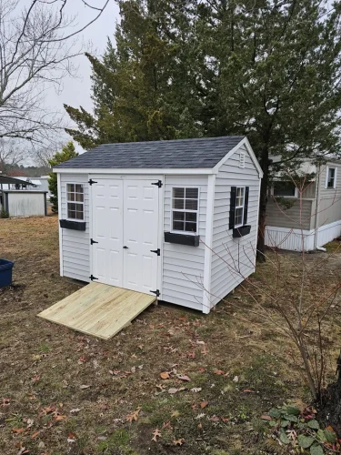 JSSB-12.17.24-vinyl-aframe-black-flowerboxes-extra-window